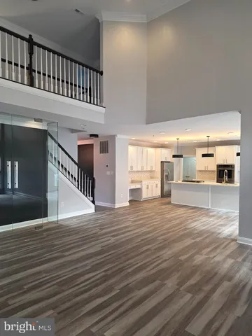 a bathroom with a sink vanity and toilet