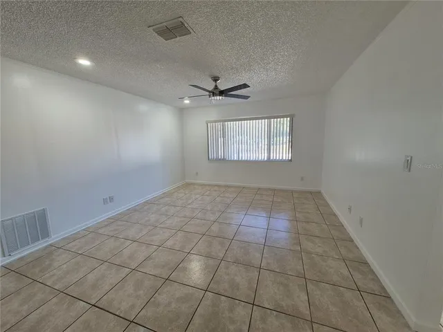 a kitchen with stainless steel appliances a sink and cabinets