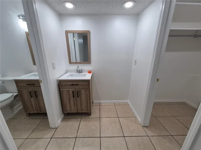 a bathroom with a sink and a toilet