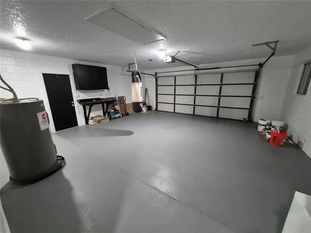 a view of an empty room with windows