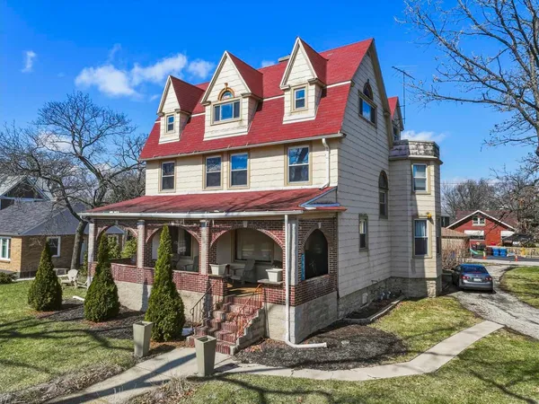a front view of a house with yard