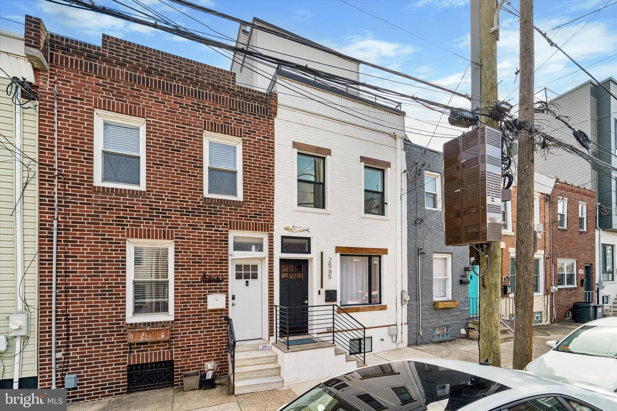 a front view of a building with glass windows