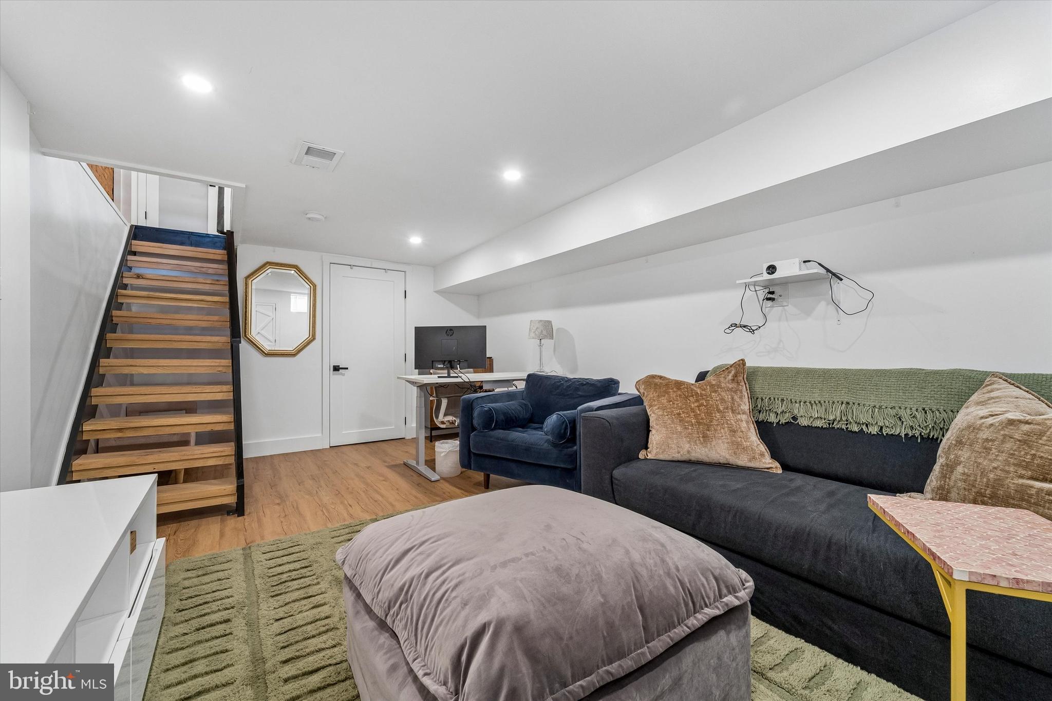 2565 Tulip Street Philadelphia, PA 19125 - Photo 15 of 15 a living room with furniture and wooden floor