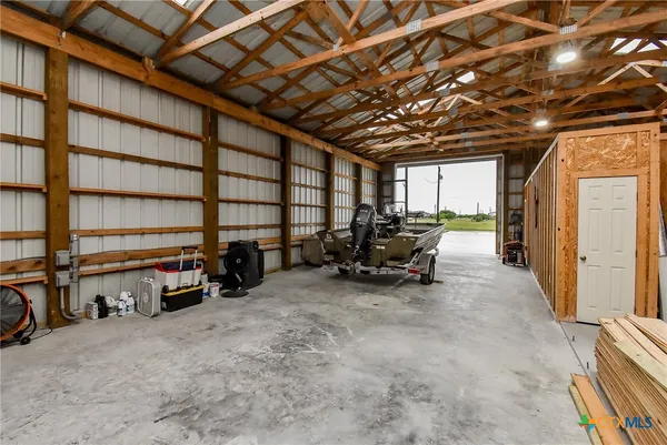 a view of a room with car parked