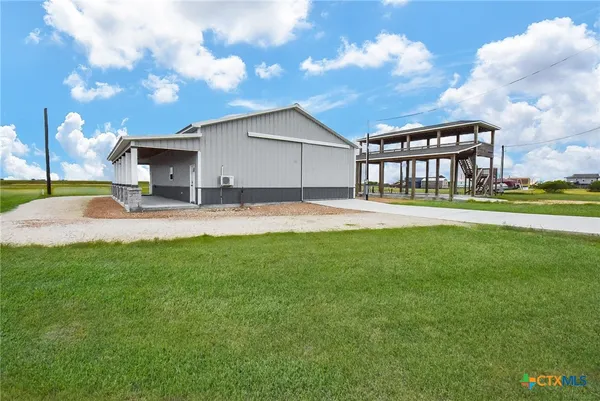 a house view with outdoor space and sitting space