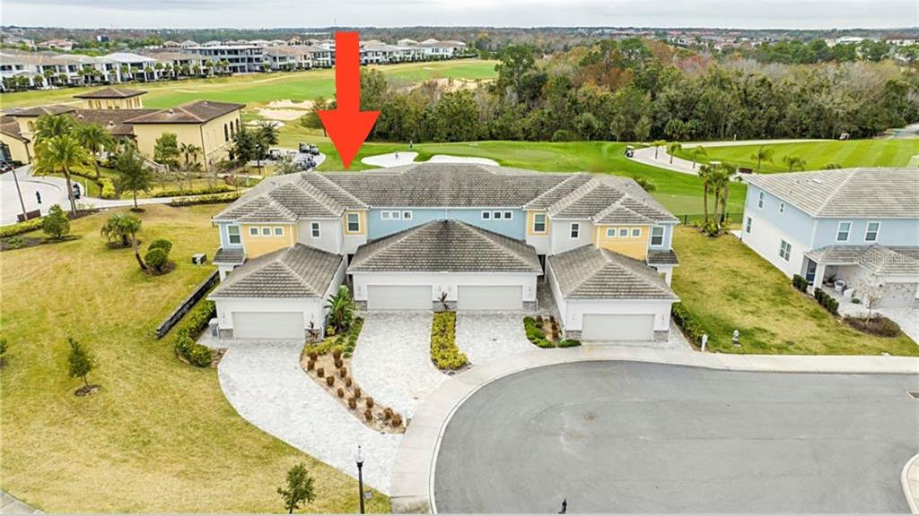 880 Driving Range Court Reunion, FL 34747 - Photo 1 of 1 an aerial view of a swimming pool with a yard