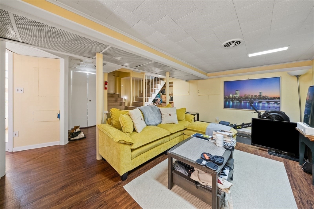 39-41 Donnybrook Road Boston, MA 02135 - Photo 13 of 37 a living room with furniture and a wooden floor