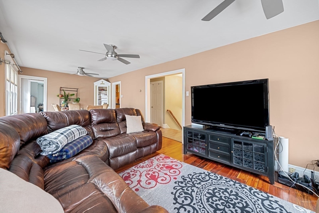 39-41 Donnybrook Road Boston, MA 02135 - Photo 17 of 37 a living room with furniture and a flat screen tv