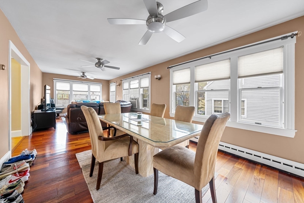 39-41 Donnybrook Road Boston, MA 02135 - Photo 20 of 37 a view of a dining room with furniture window and wooden floor