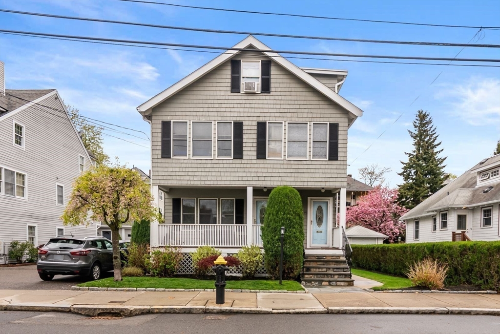 39-41 Donnybrook Road Boston, MA 02135 - Photo 2 of 37 a front view of a house with a yard