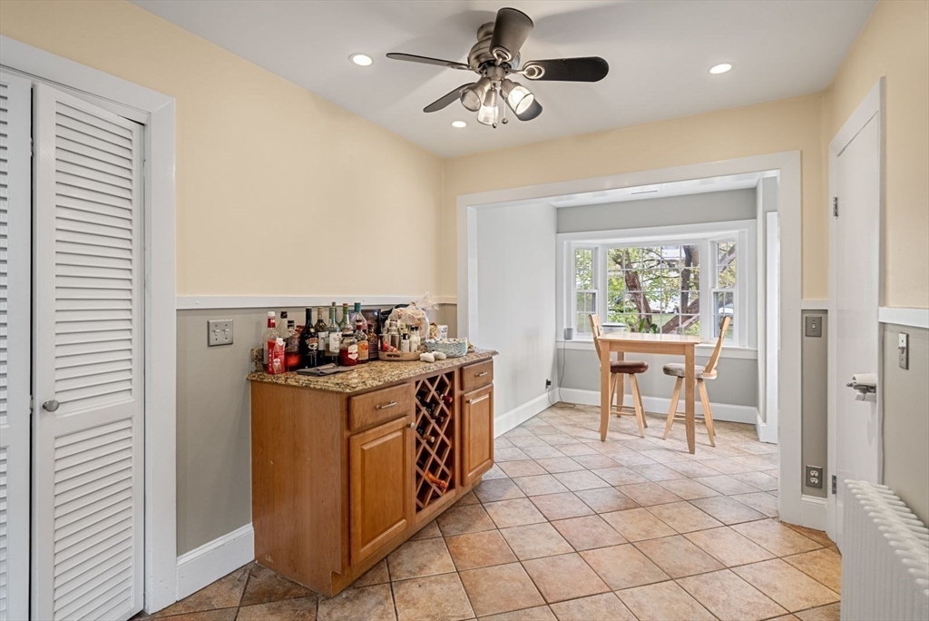 39-41 Donnybrook Road Boston, MA 02135 - Photo 24 of 37 a open kitchen with stainless steel appliances granite countertop a stove and a sink