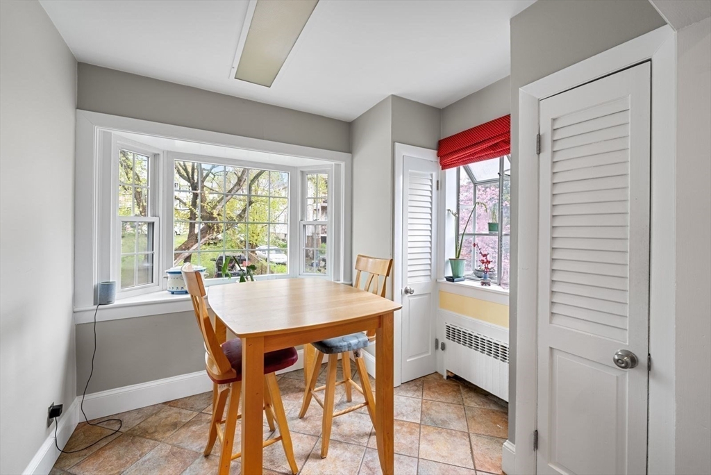 39-41 Donnybrook Road Boston, MA 02135 - Photo 25 of 37 a view of a dining room with furniture window and outside view