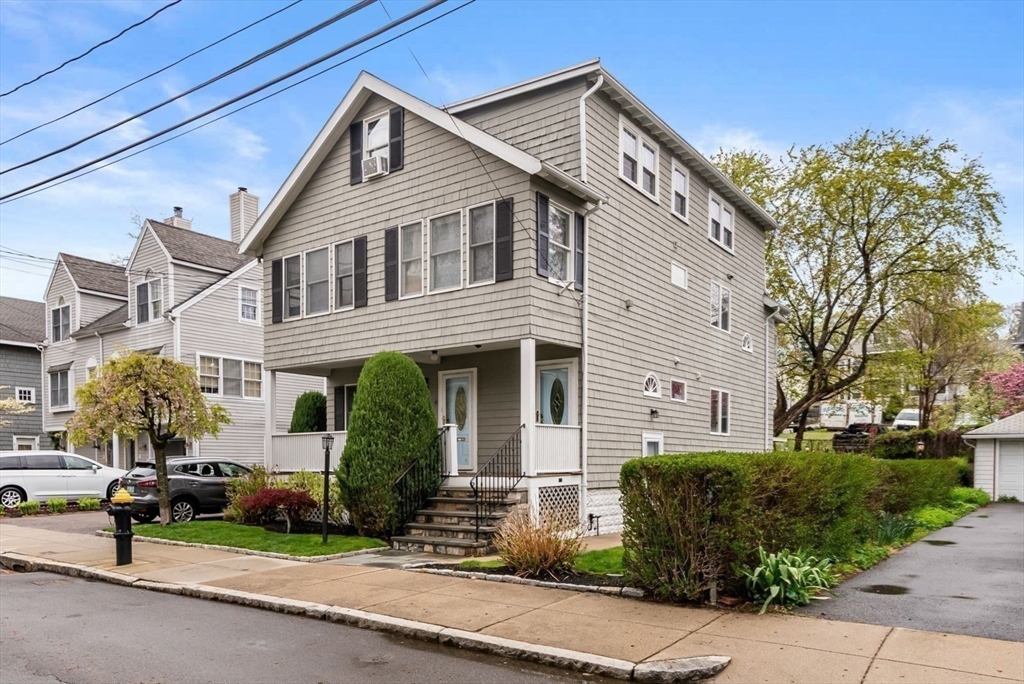 39-41 Donnybrook Road Boston, MA 02135 - Photo 3 of 37 a front view of a house with garden