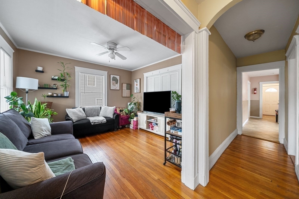 39-41 Donnybrook Road Boston, MA 02135 - Photo 6 of 37 a living room with furniture and a flat screen tv
