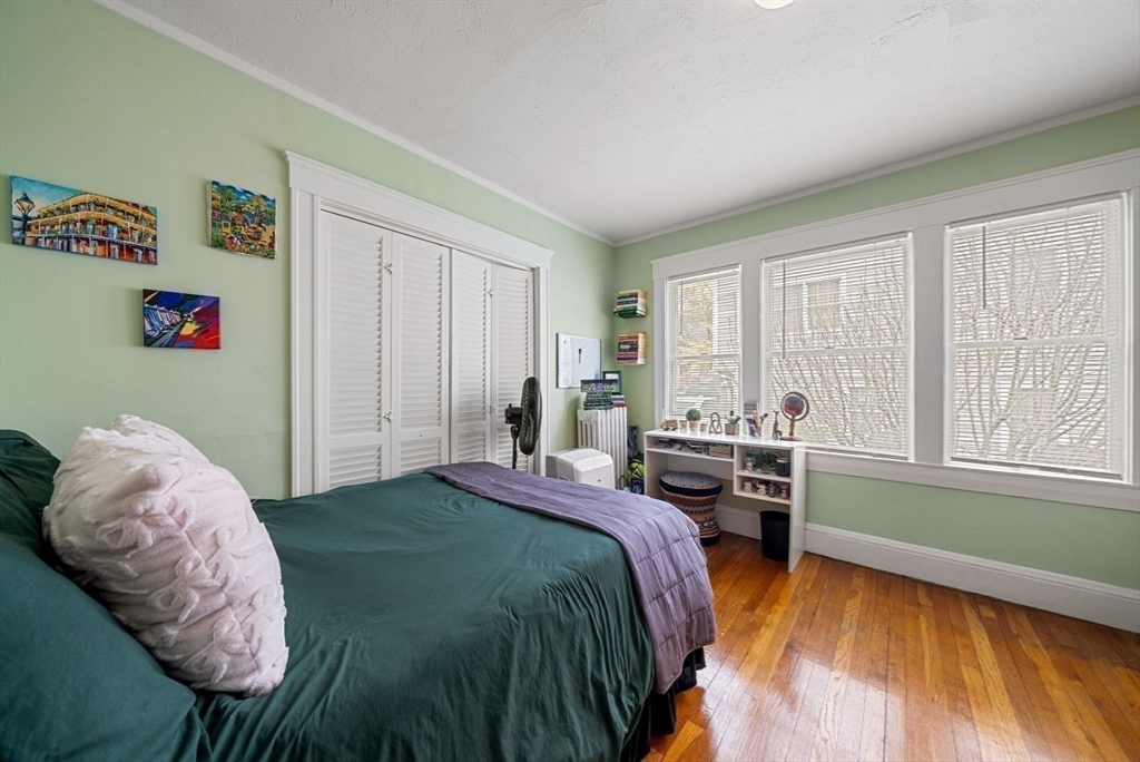 39-41 Donnybrook Road Boston, MA 02135 - Photo 9 of 37 a bedroom with a bed and a window