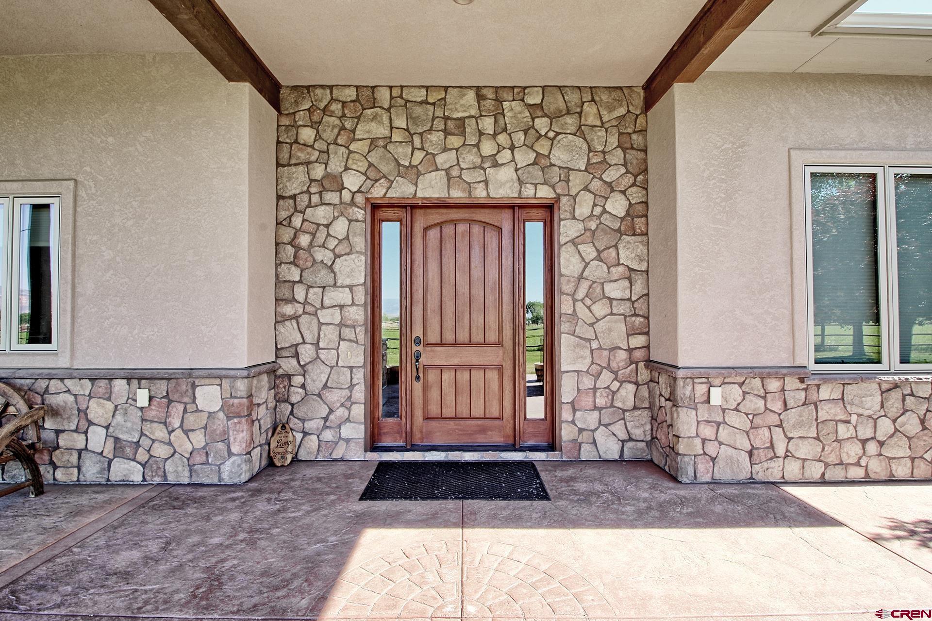 971 24 Road Grand Junction, CO 81505 - Photo 3 of 43 a view of front door of a house