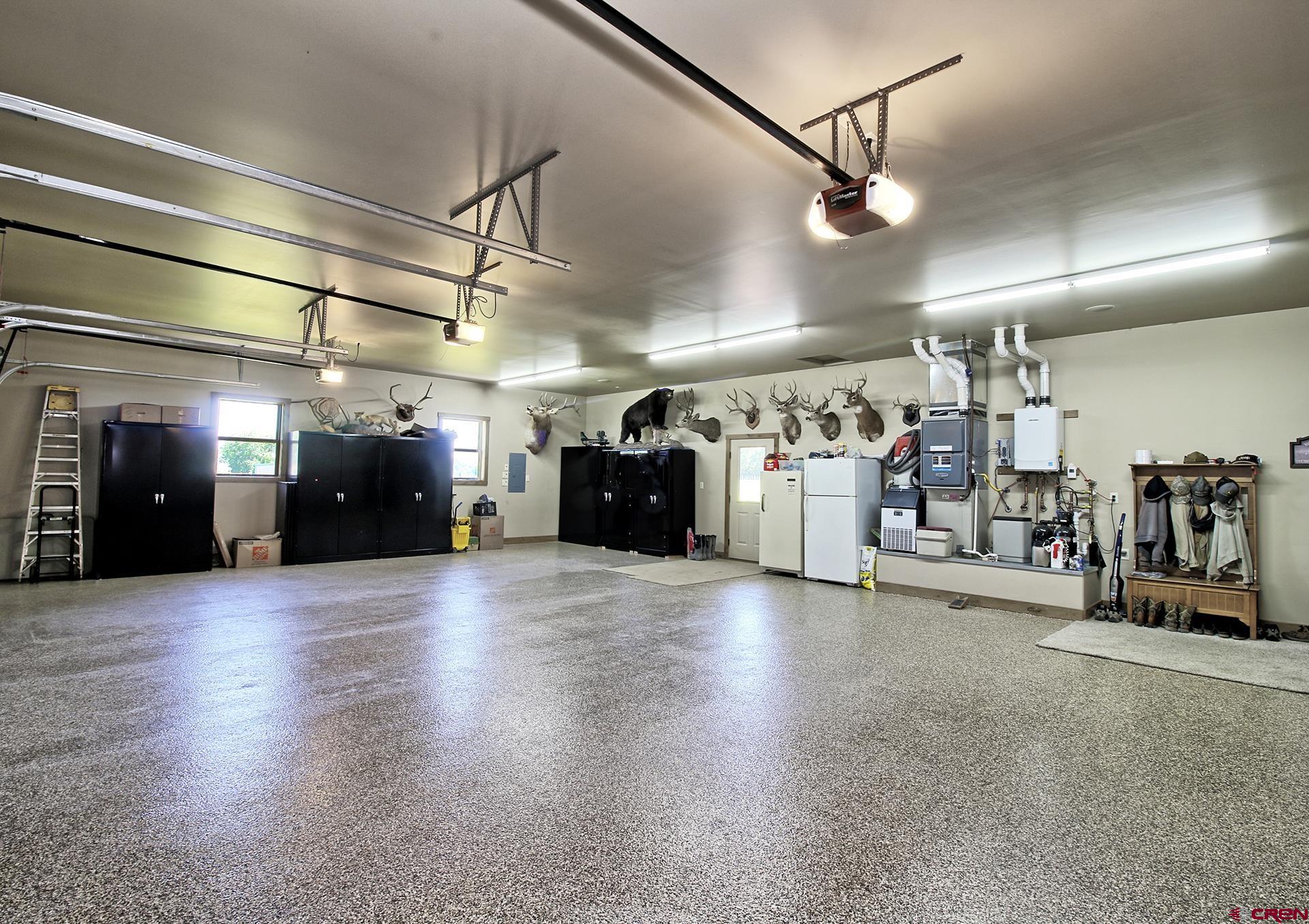 971 24 Road Grand Junction, CO 81505 - Photo 32 of 43 a view of a garage with gym equipment