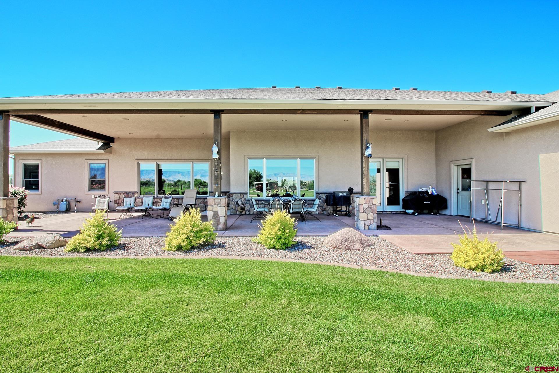 971 24 Road Grand Junction, CO 81505 - Photo 38 of 43 a view of a play house with a patio