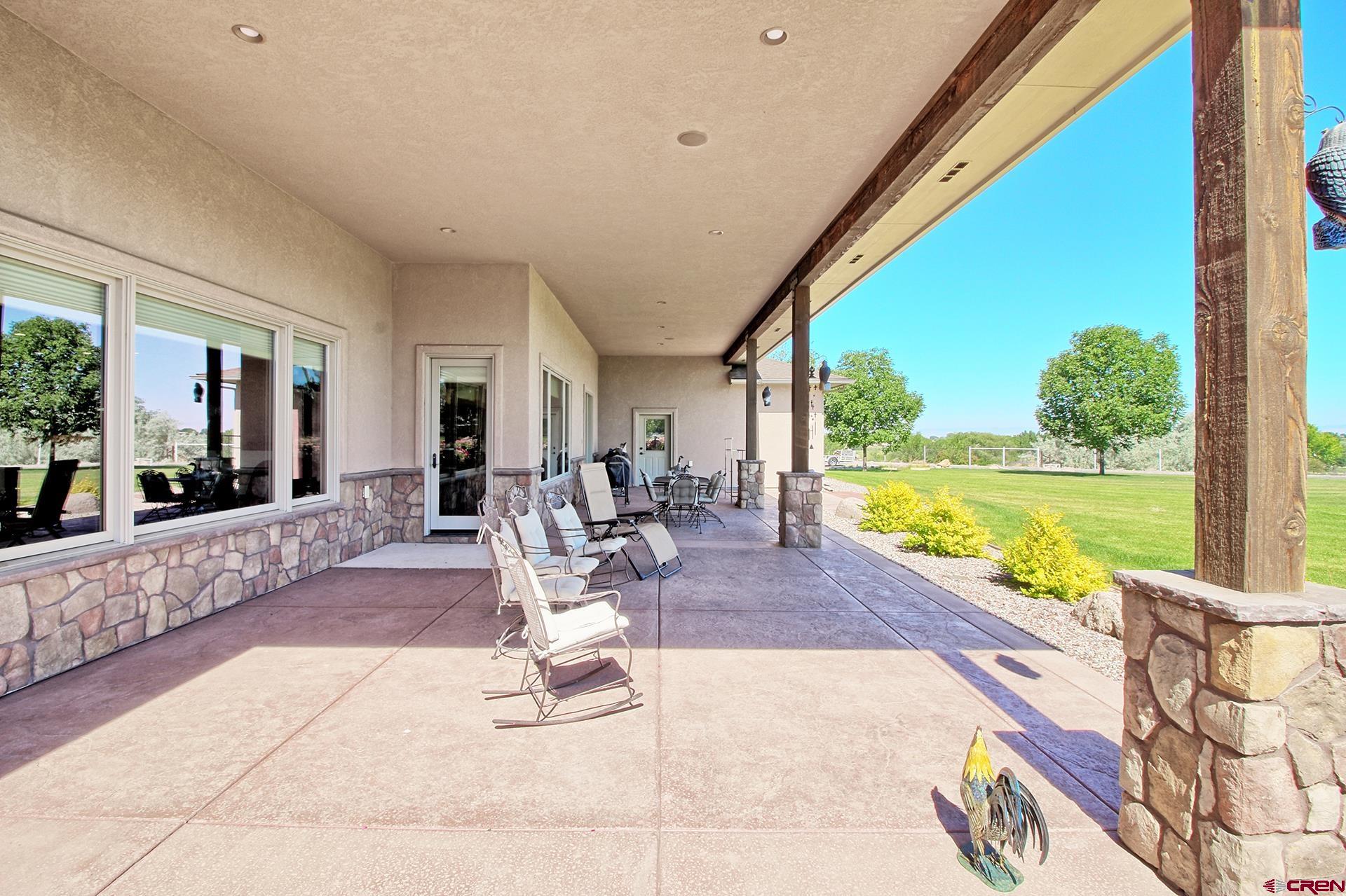971 24 Road Grand Junction, CO 81505 - Photo 40 of 43 a view of a living room and floor to ceiling window or lake