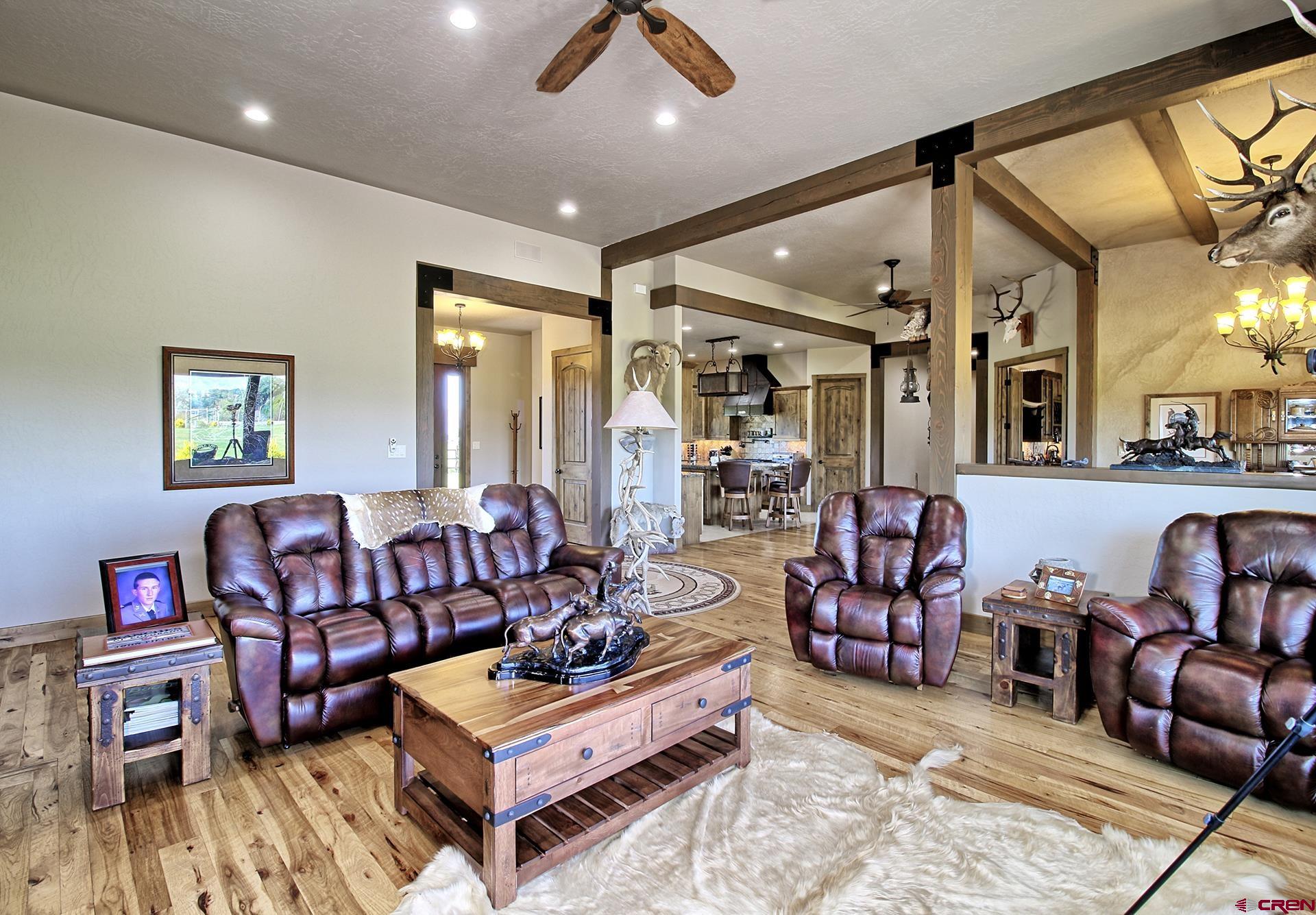 971 24 Road Grand Junction, CO 81505 - Photo 6 of 43 a living room with furniture