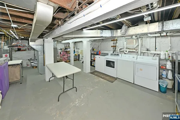 a black and white photo of a living room