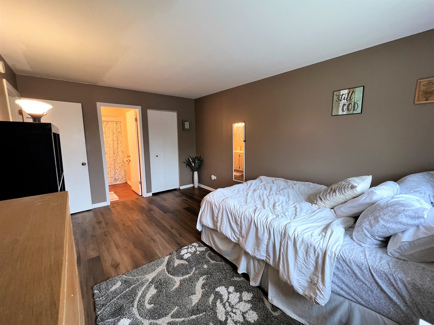 14970 Pulaski Road, Unit 2 Midlothian, IL 60445 - Photo 12 of 20 a bedroom with a bed and a flat screen tv