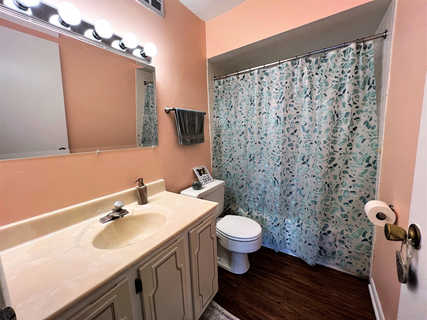 14970 Pulaski Road, Unit 2 Midlothian, IL 60445 - Photo 13 of 20 a bathroom with a sink toilet and shower