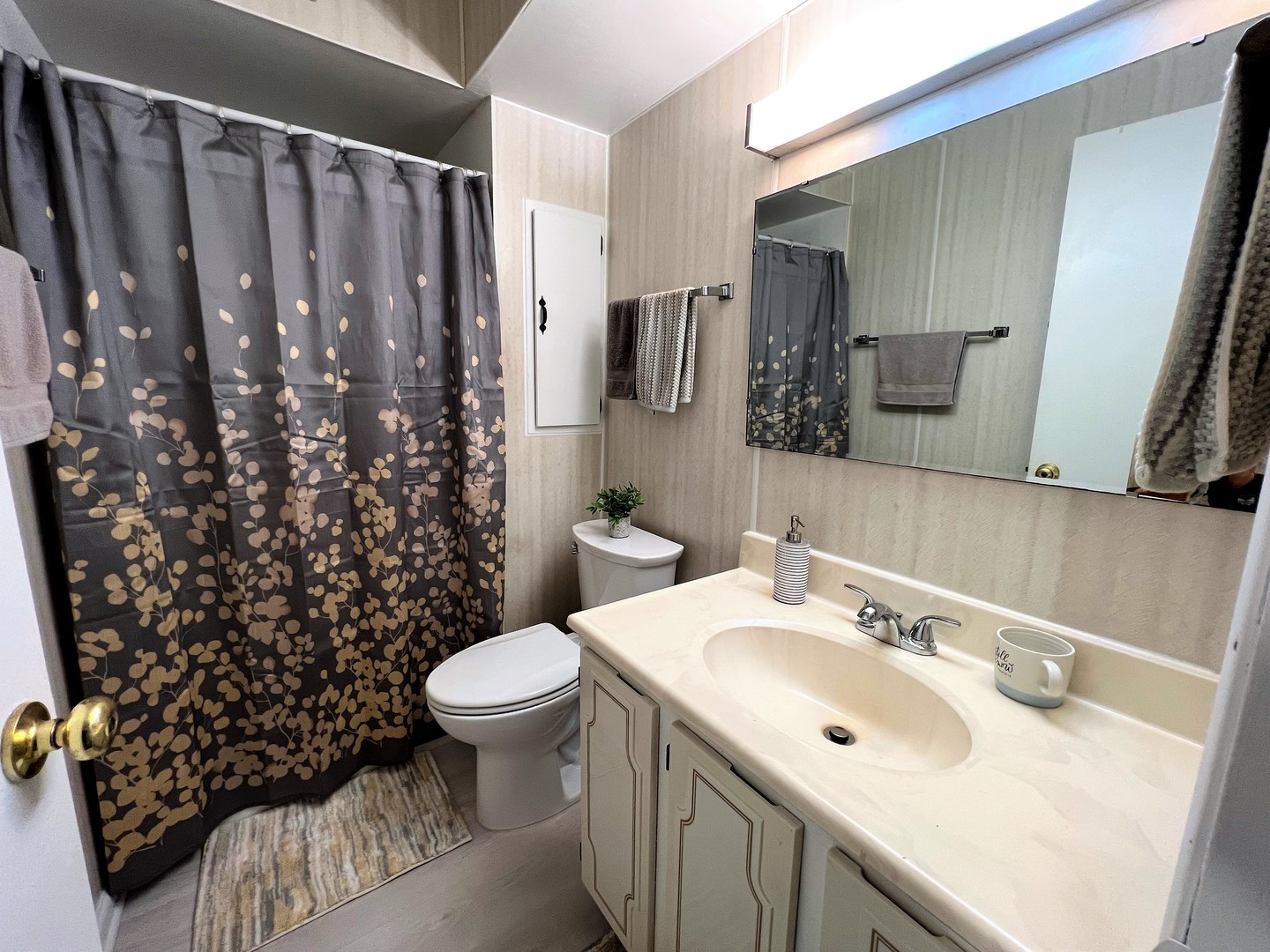 14970 Pulaski Road, Unit 2 Midlothian, IL 60445 - Photo 14 of 20 a bathroom with a sink toilet and shower