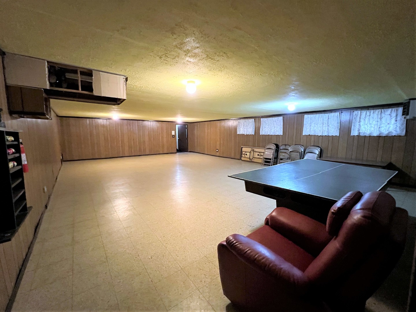 14970 Pulaski Road, Unit 2 Midlothian, IL 60445 - Photo 15 of 20 a living room with furniture and a flat screen tv