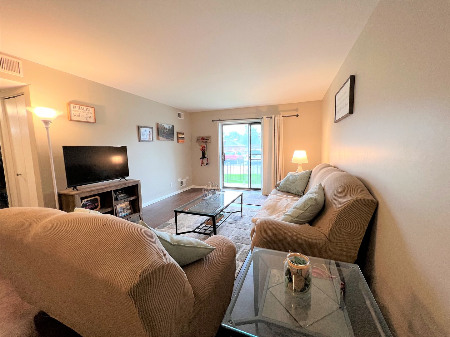 14970 Pulaski Road, Unit 2 Midlothian, IL 60445 - Photo 2 of 20 a bedroom with bed and a flat screen tv