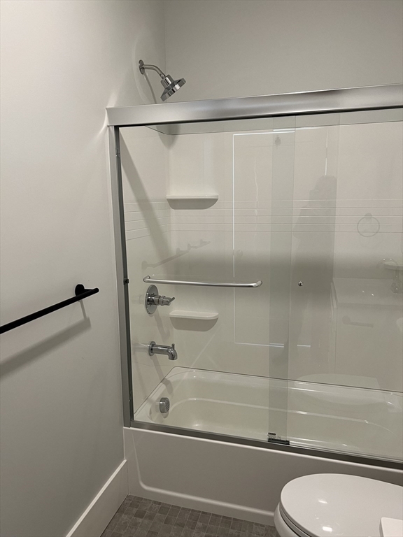 34 St Joseph Street, Unit 21 Fall River, MA 02723 - Photo 8 of 15 a bathroom with a shower and a toilet