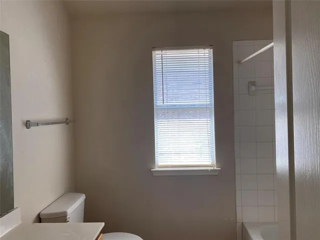 a bathroom with a toilet