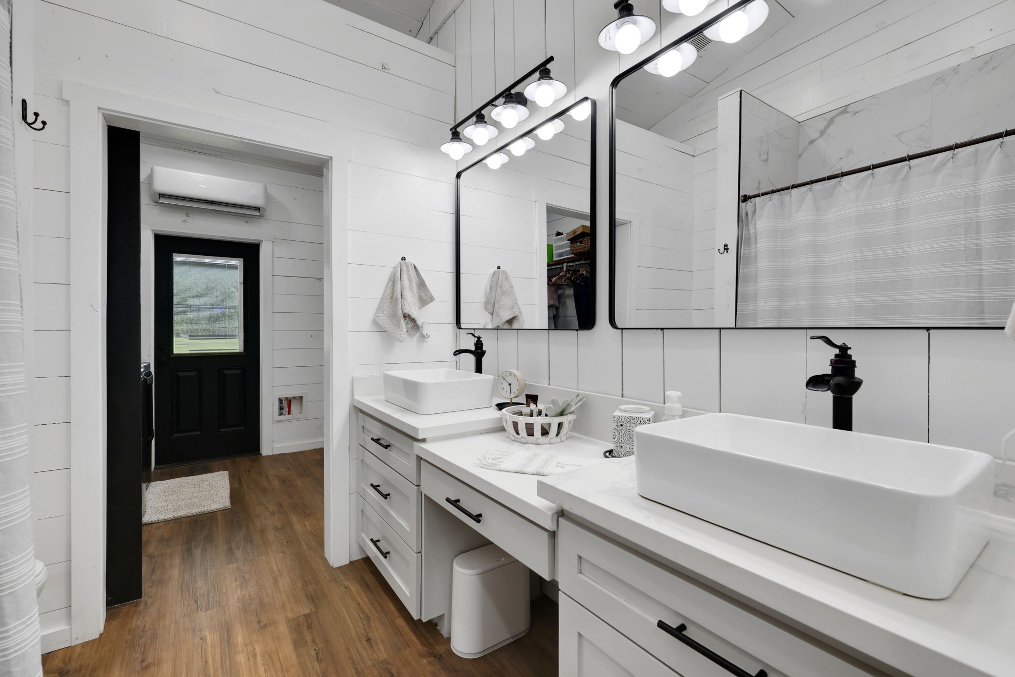 133 Timber Ridge Road Liberty, TX 77575 - Photo 13 of 29 a bathroom with a sink and a mirror