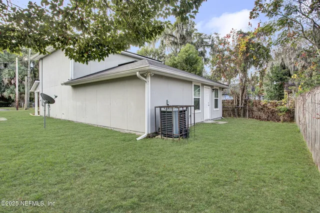 a house with trees in the background
