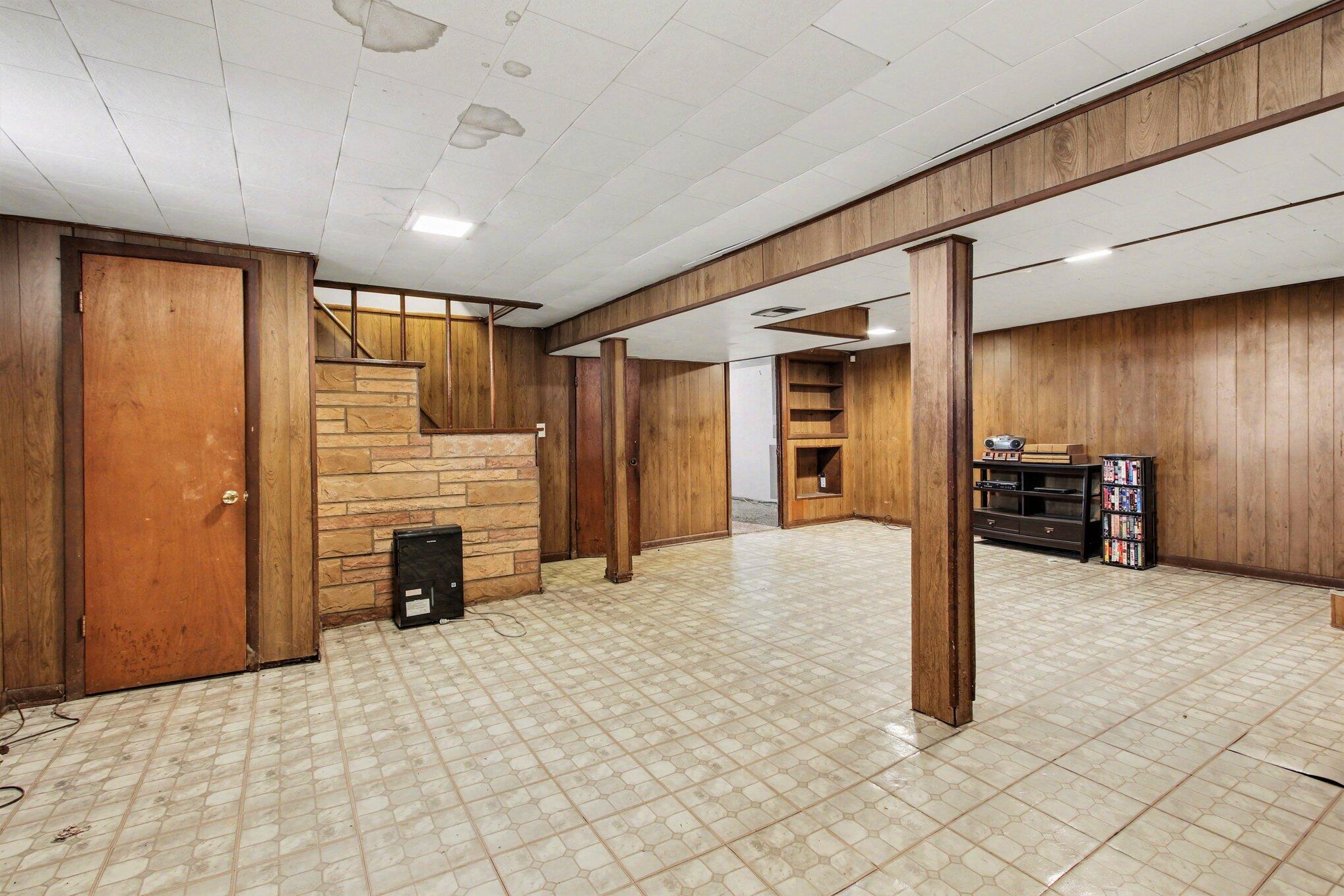 1741 Cleveland Street Gary, IN 46404 - Photo 13 of 16 a view of an empty room with a fireplace