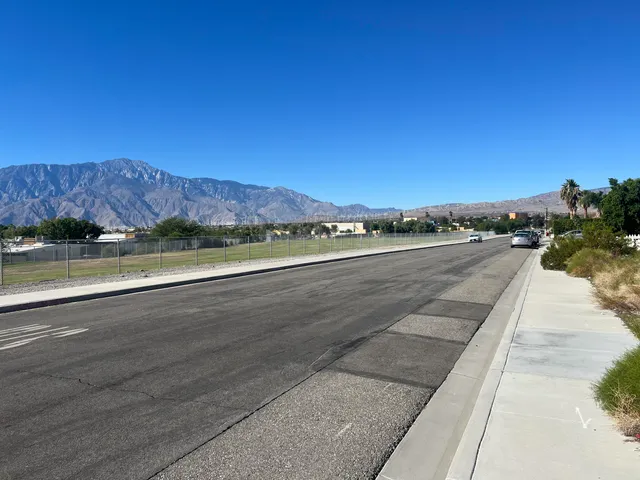 a view of a yard with a mountain
