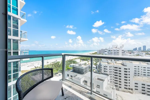 a view of balcony with furniture