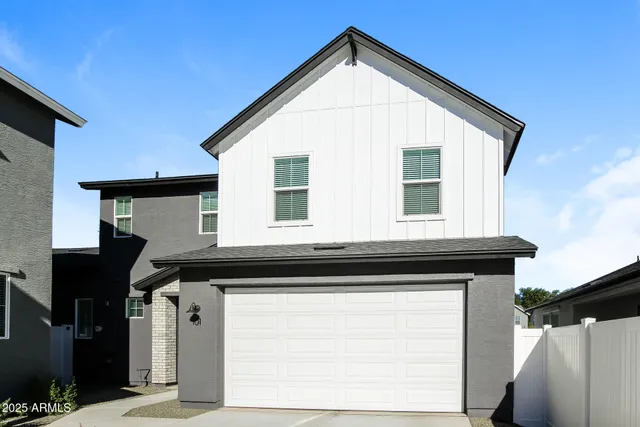 a front view of a house with parking