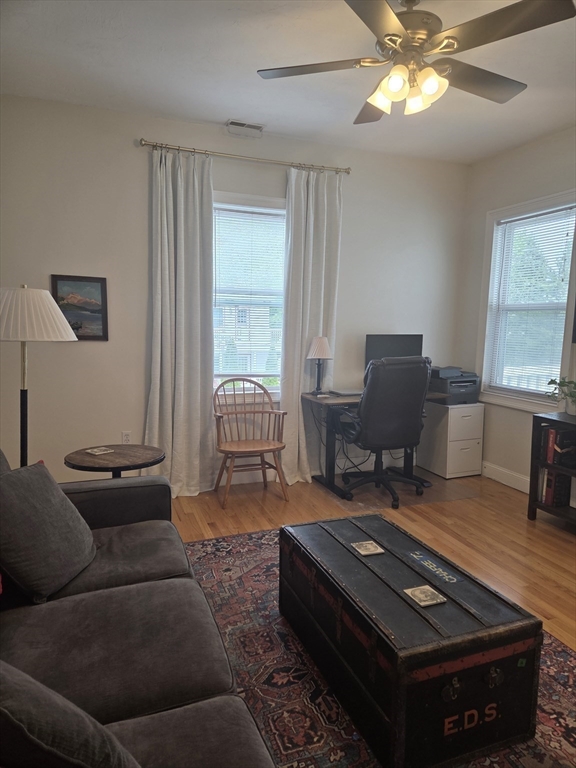 84 South, Unit 84 Waltham, MA 02451 - Photo 6 of 9 a living room with furniture and a window