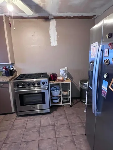 a view of a storage & utility room with stuff