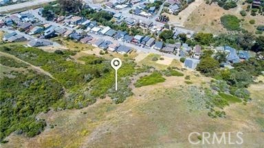 3092 Gilbert Avenue Cayucos, CA 93430 - Photo 3 of 5 a view of a tree with a yard