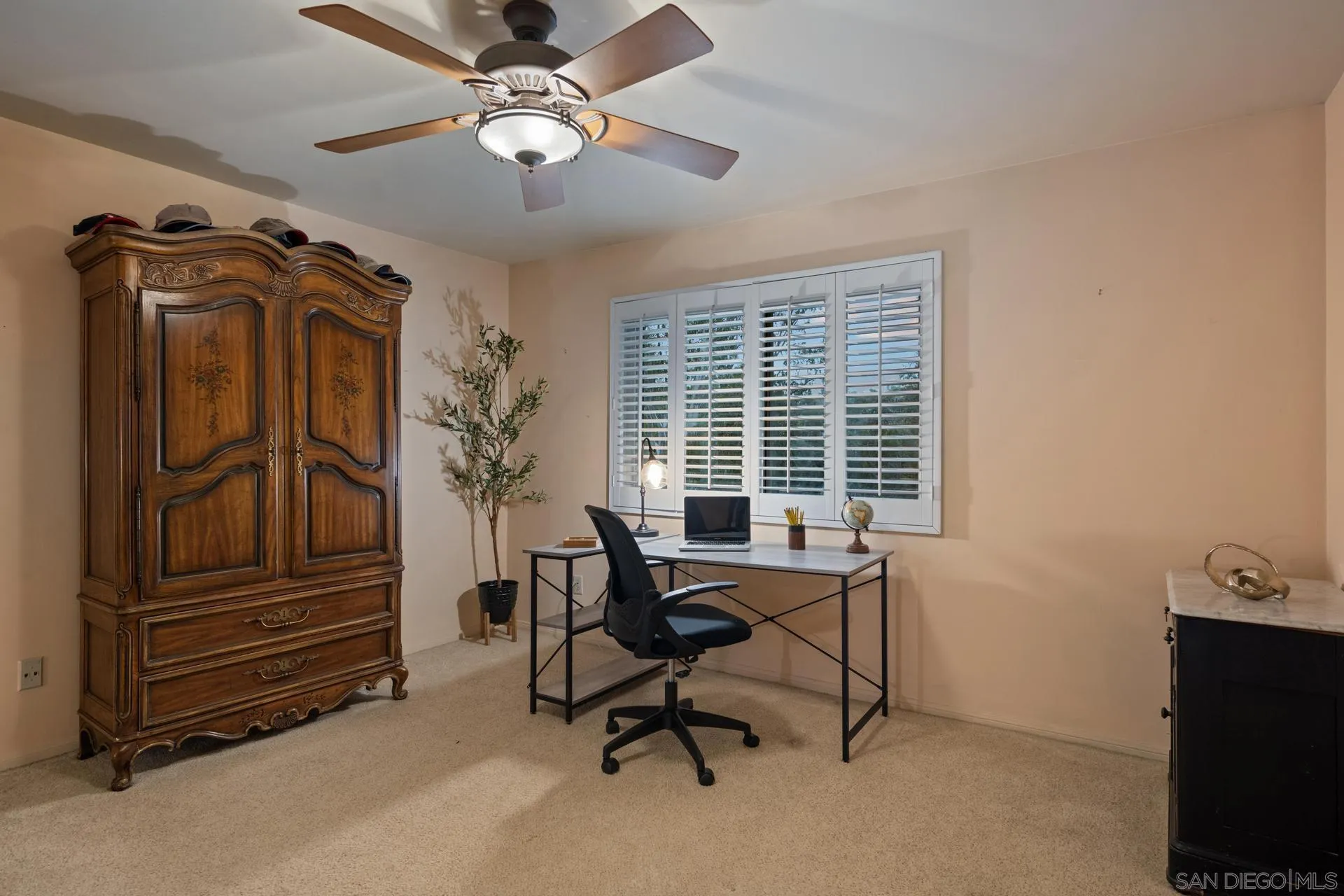 10575 Spruce Grove Avenue San Diego, CA 92131 - Photo 14 of 33 a view of a livingroom with furniture and a window