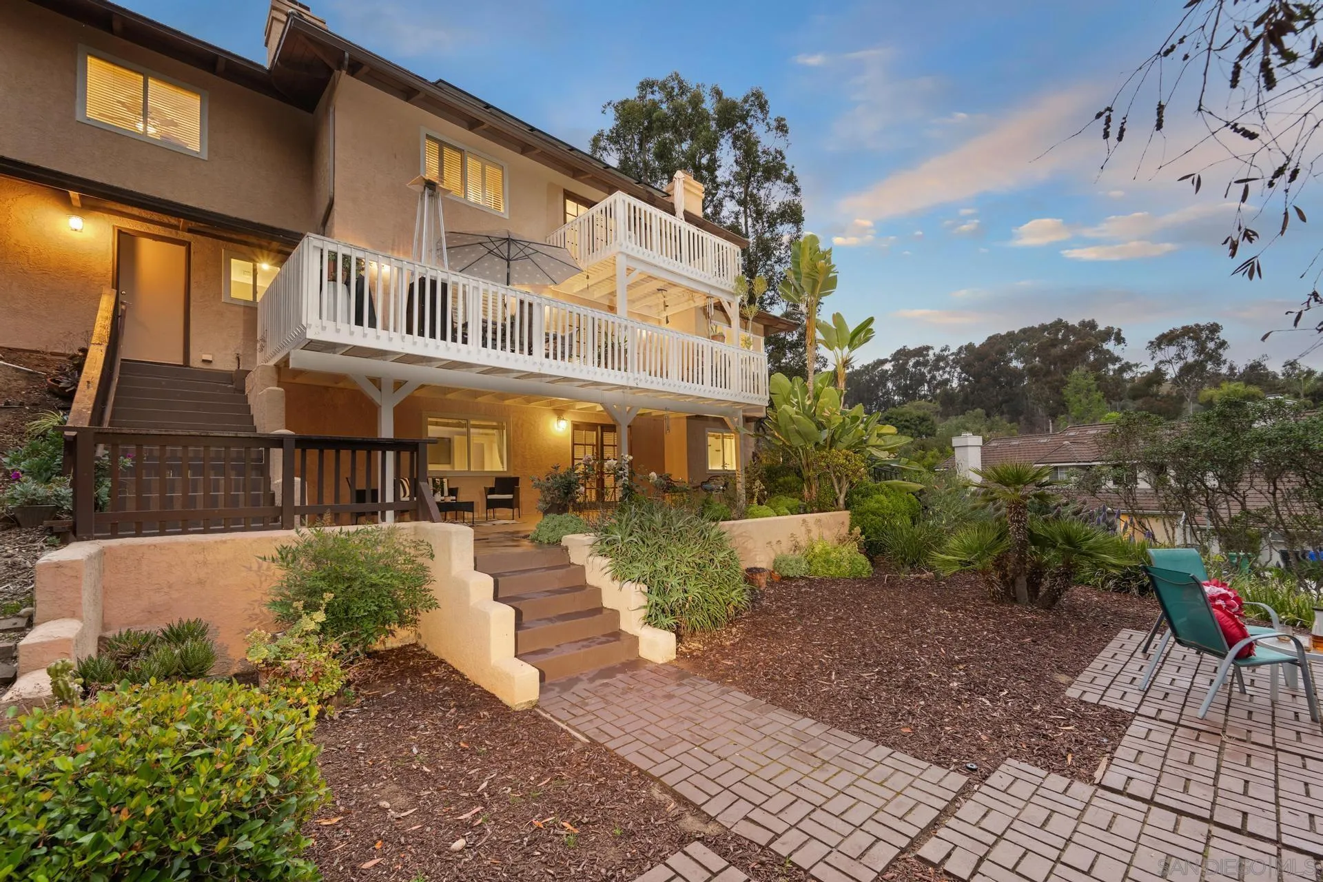 10575 Spruce Grove Avenue San Diego, CA 92131 - Photo 27 of 33 a view of a building with a garden