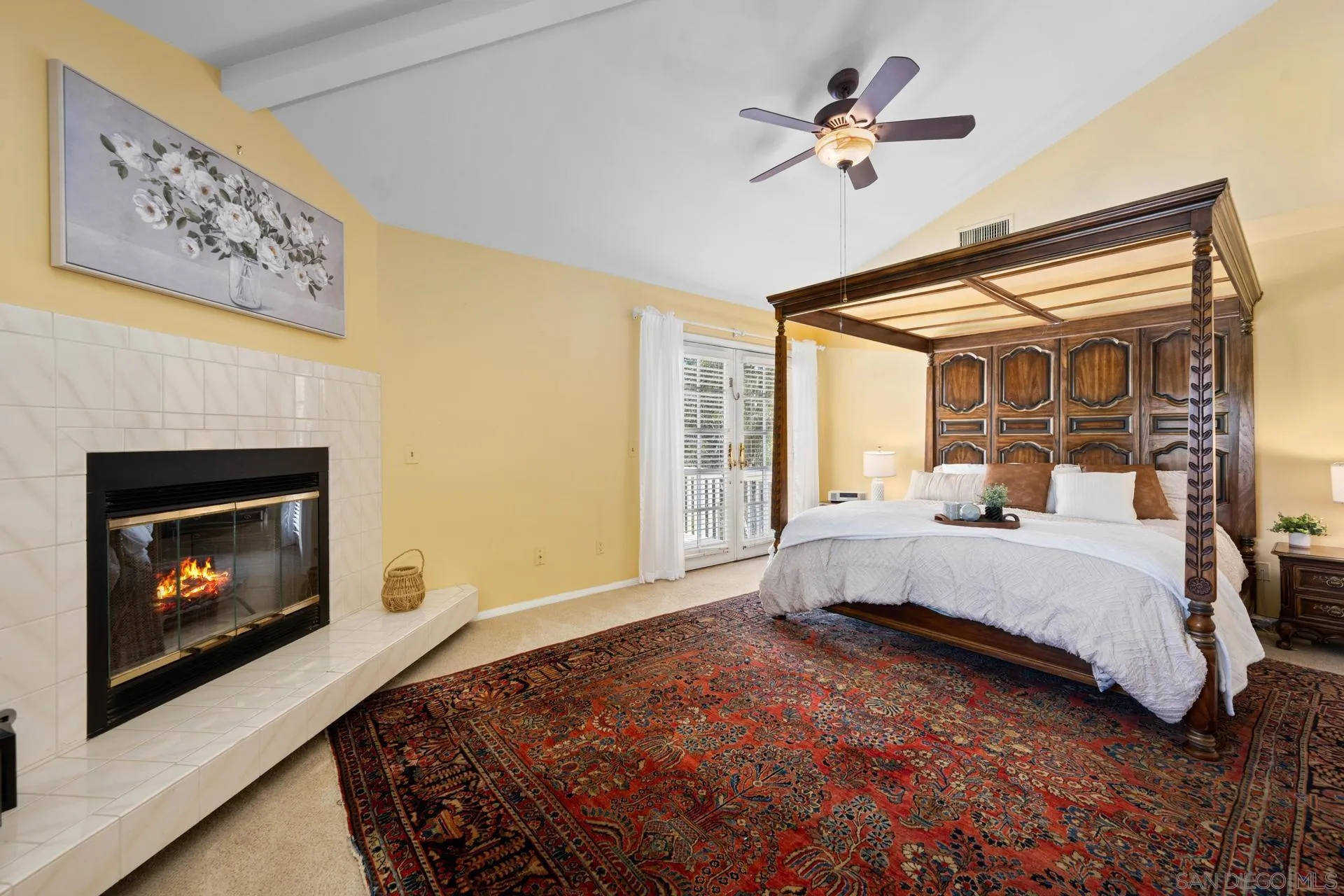 10575 Spruce Grove Avenue San Diego, CA 92131 - Photo 9 of 33 a bed room with a bed and a fireplace