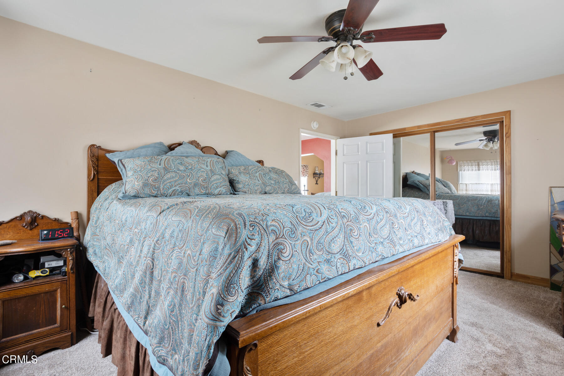 7518 Kyle Street Tujunga, CA 91042 - Photo 16 of 28 a bedroom with a bed and dresser