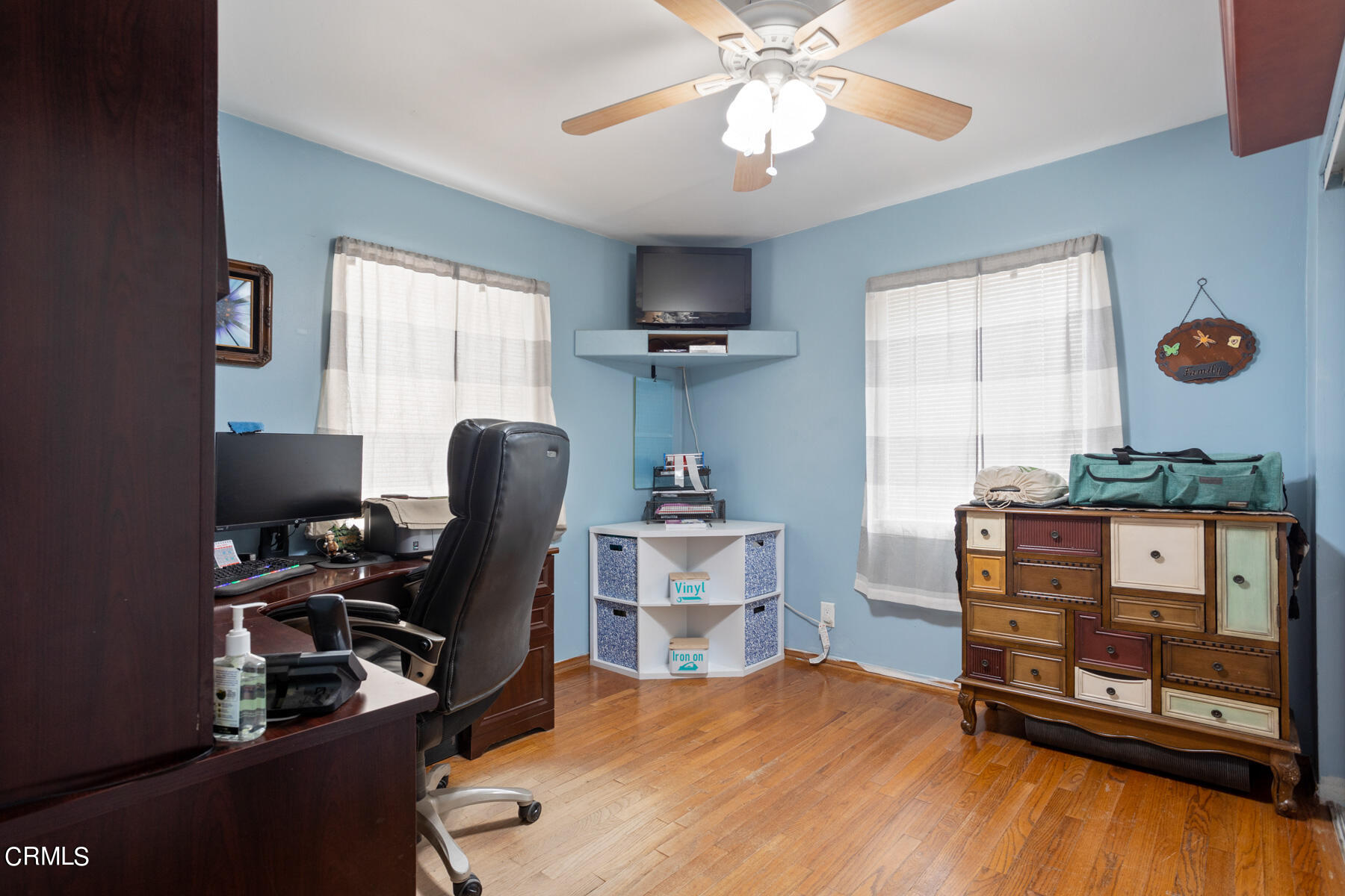 7518 Kyle Street Tujunga, CA 91042 - Photo 20 of 28 a view of a workspace with furniture and a window