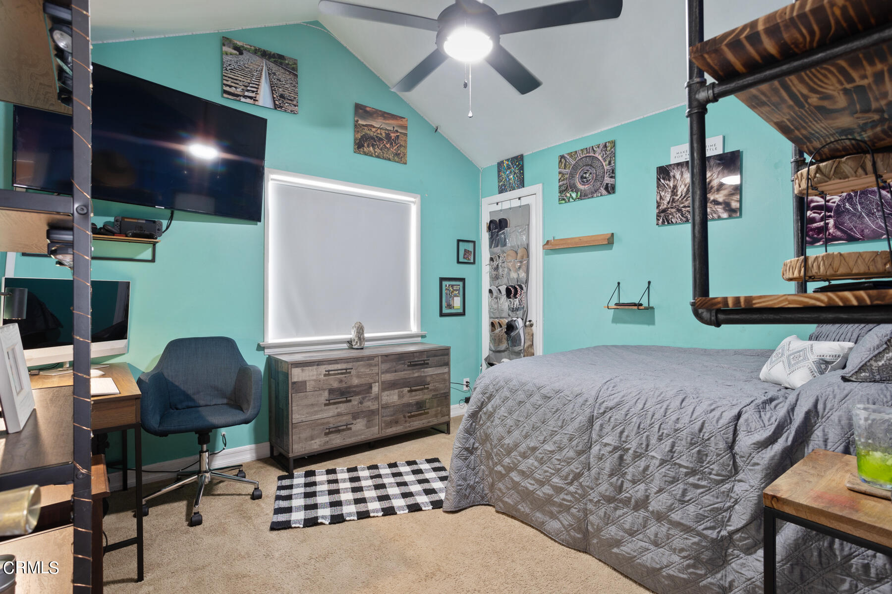 7518 Kyle Street Tujunga, CA 91042 - Photo 22 of 28 a bedroom with a bed and a flat screen tv