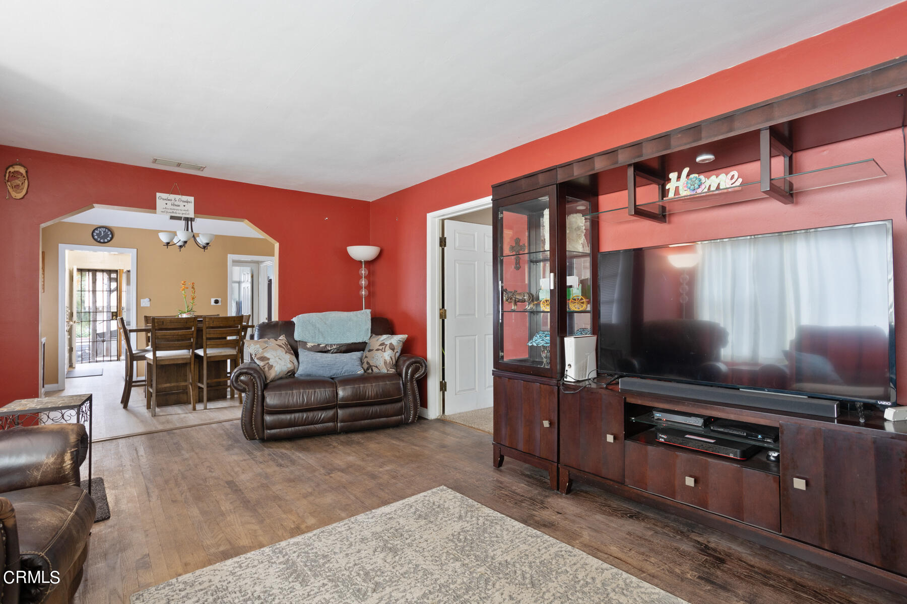 7518 Kyle Street Tujunga, CA 91042 - Photo 7 of 28 a living room with furniture and a flat screen tv