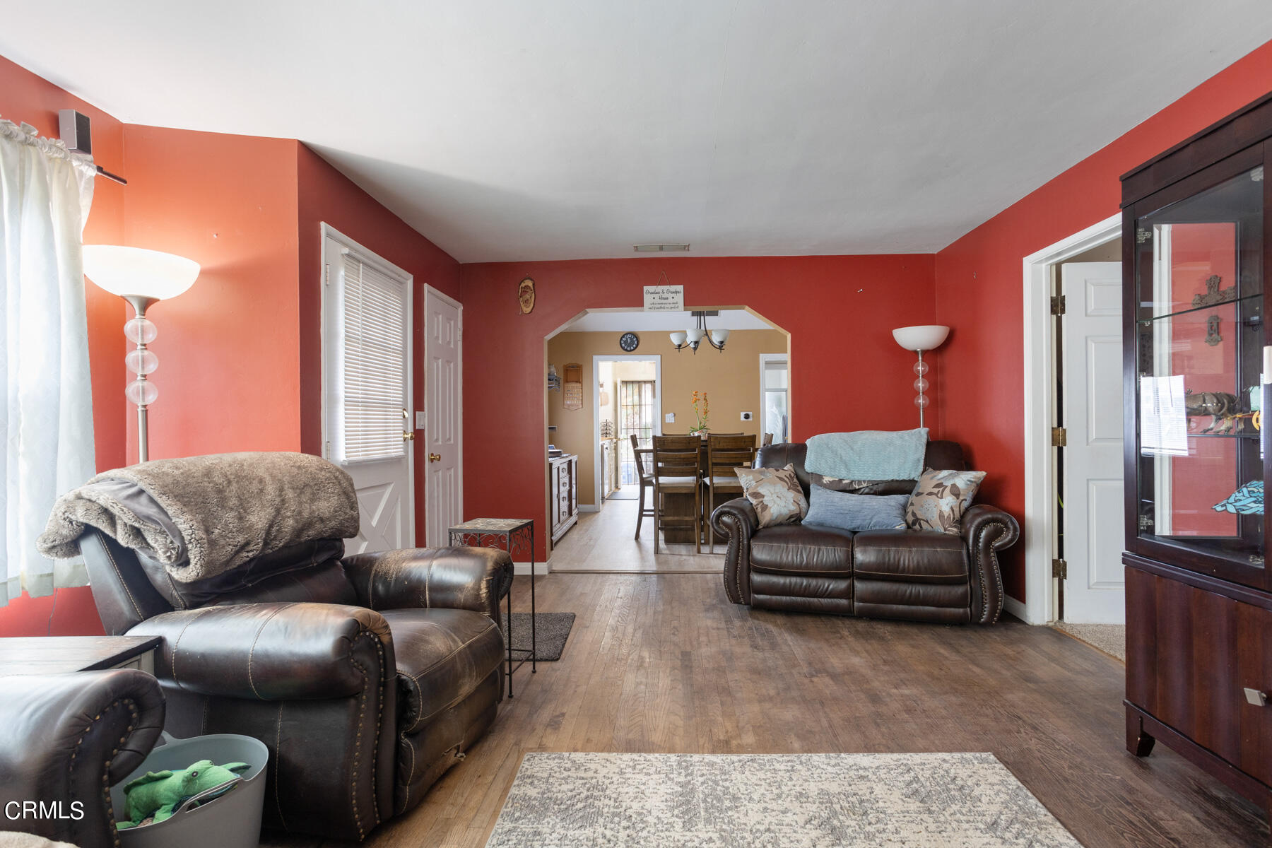 7518 Kyle Street Tujunga, CA 91042 - Photo 8 of 28 a living room with furniture and a large window