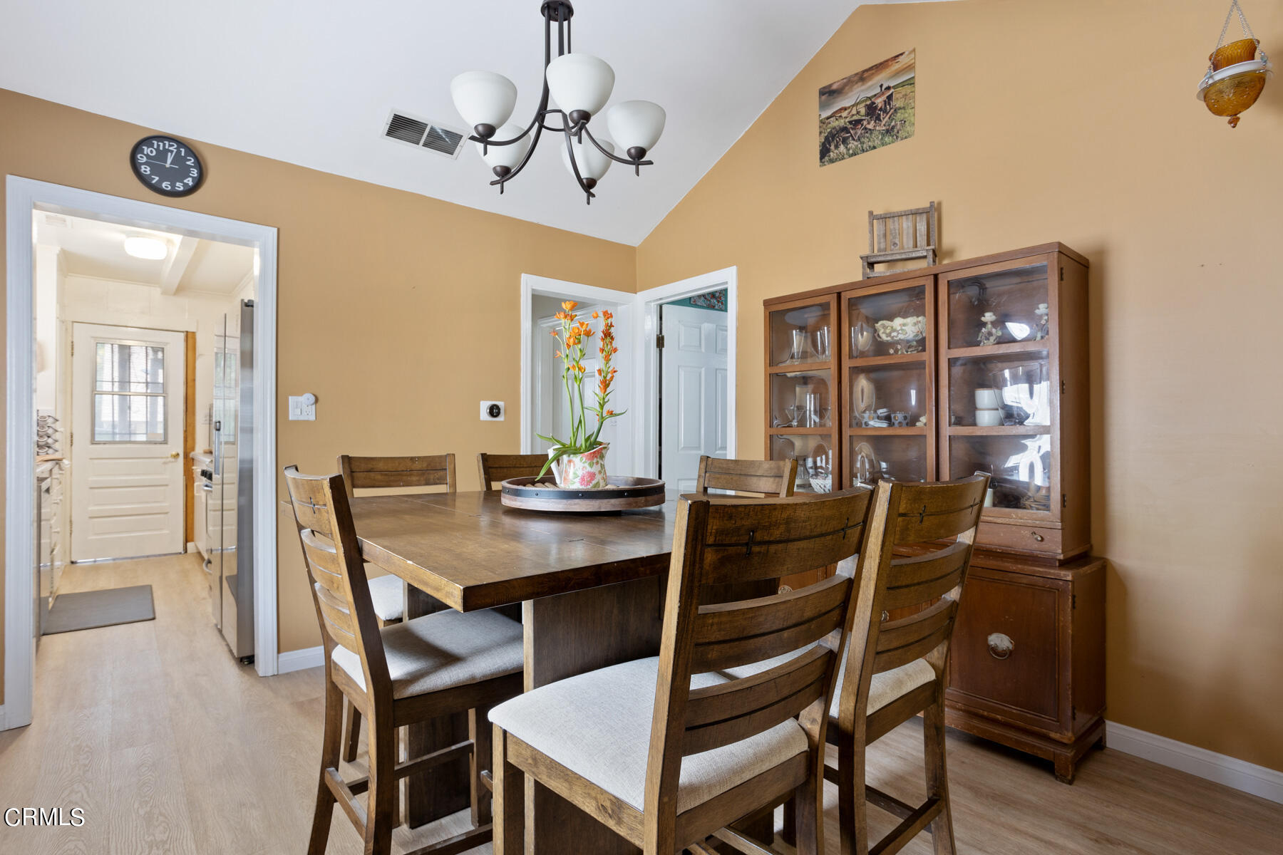 7518 Kyle Street Tujunga, CA 91042 - Photo 9 of 28 a view of a dining room with furniture